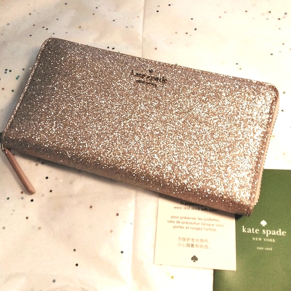 kate spade Handbags - ♠NWT KATE SPADE♠ CONTINENTAL LARGE ROSE GOLD "LOLA JOELEY" ZIP AROUND WALLET